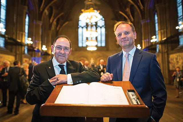 Signing the devolution deal in Manchester