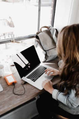 Woman working in cafe