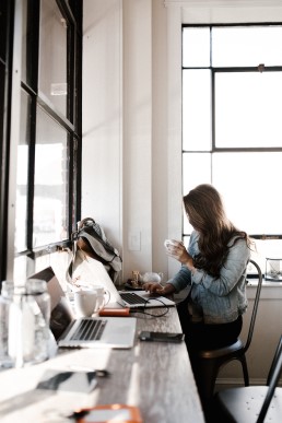 Woman working from a cafe