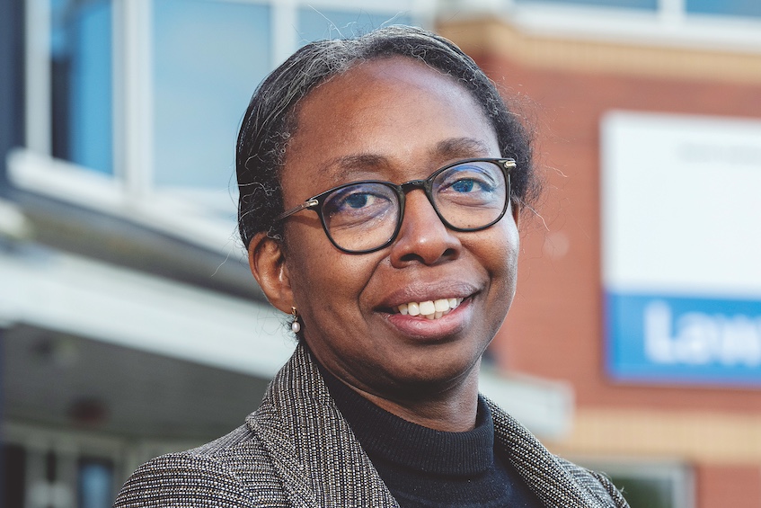 Buki Adeyemo outside Lawton House, trust head office