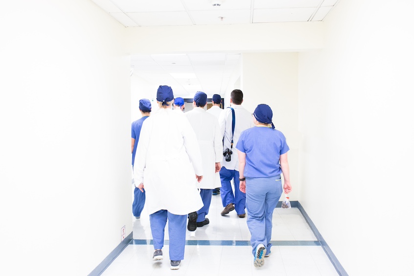 Hospital trainees in a corridor