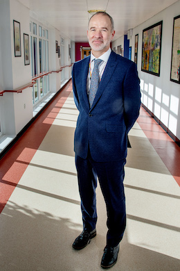 Rob Webster in a hospital corridor